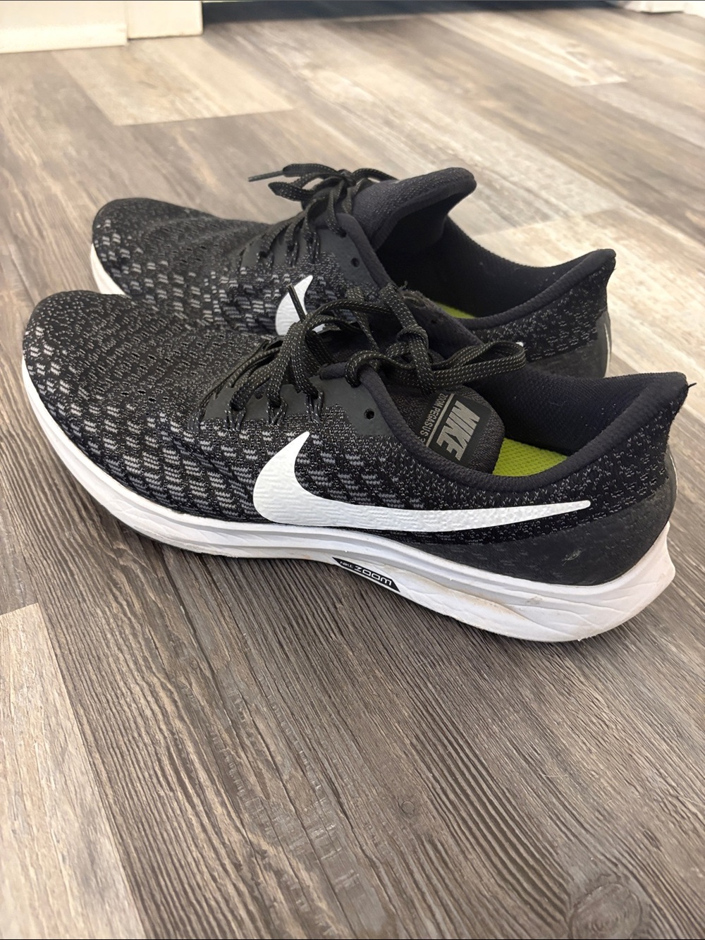 Nike Black and White Flyknit Running Sneakers